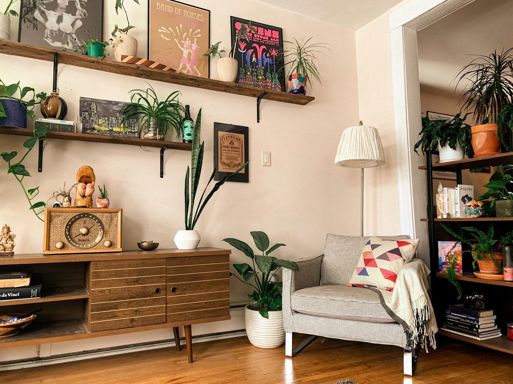 Warm table lamp on a wooden side table